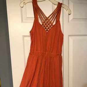 Sleeveless orange cocktail dress
